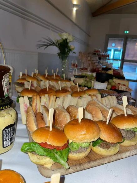 Catering display with hot dishes and finger foods professionally plated