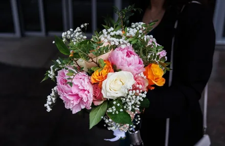 Hand-crafted floral arrangement with warm seasonal tones