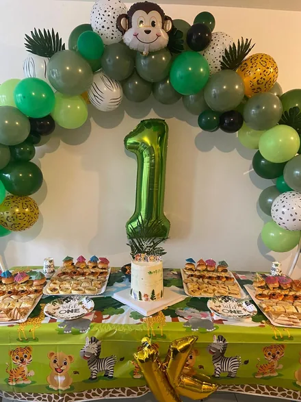 Birthday party with custom theme decor and balloon styling